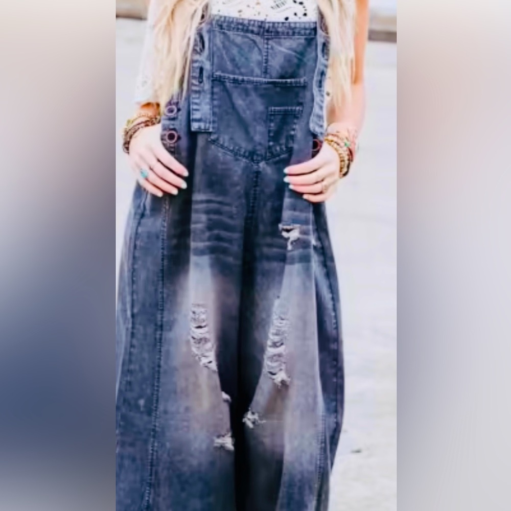 Easel black overalls. Color is faded black with white print.